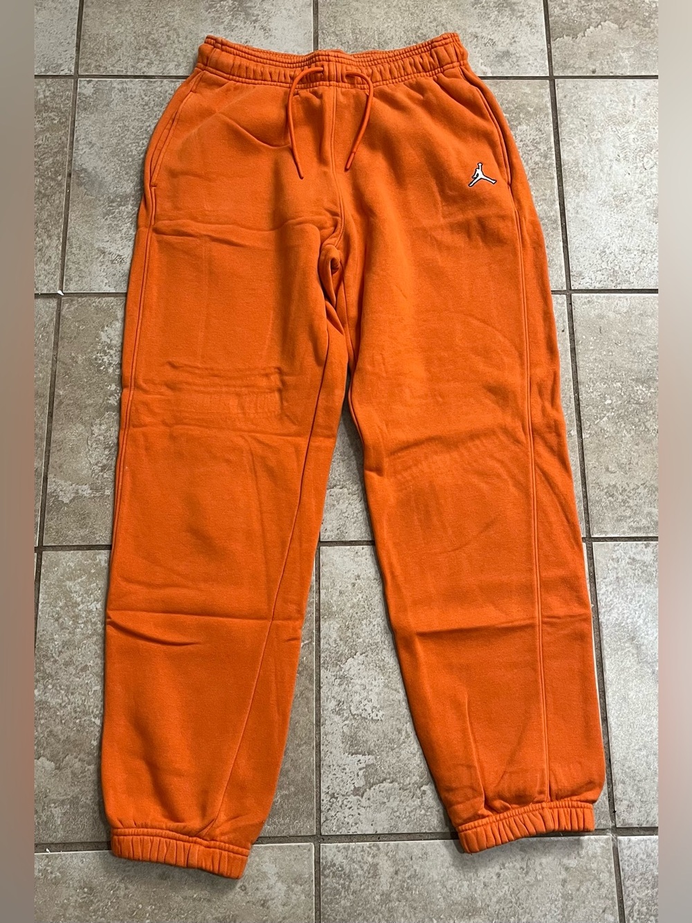 Jordan Orange Fleece Joggers with Jumpman Embroidery